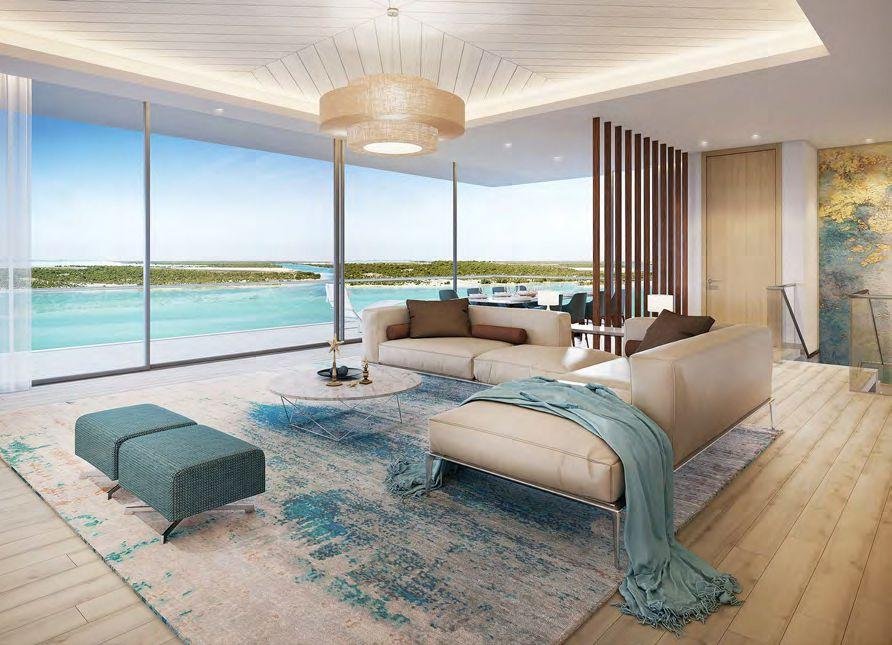 Exterior view of Mayan Yas Island apartments highlighting beachfront surroundings, golf course views, and modern architectural design
